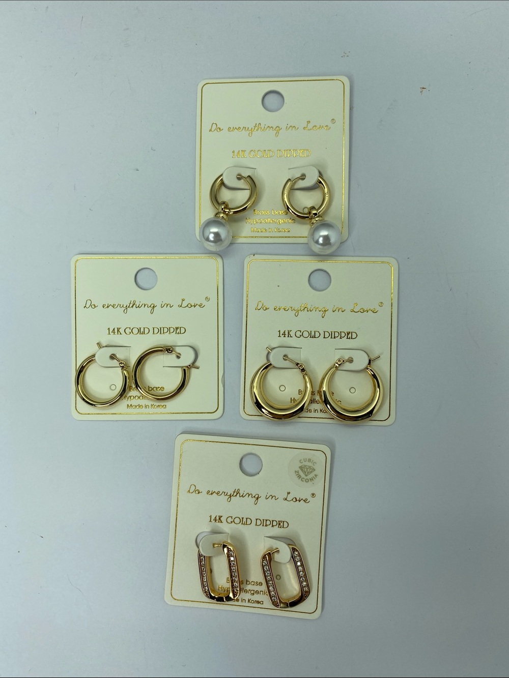 Do everything in Love Gold Hoop & Pearl Earring Set -4 pairs!